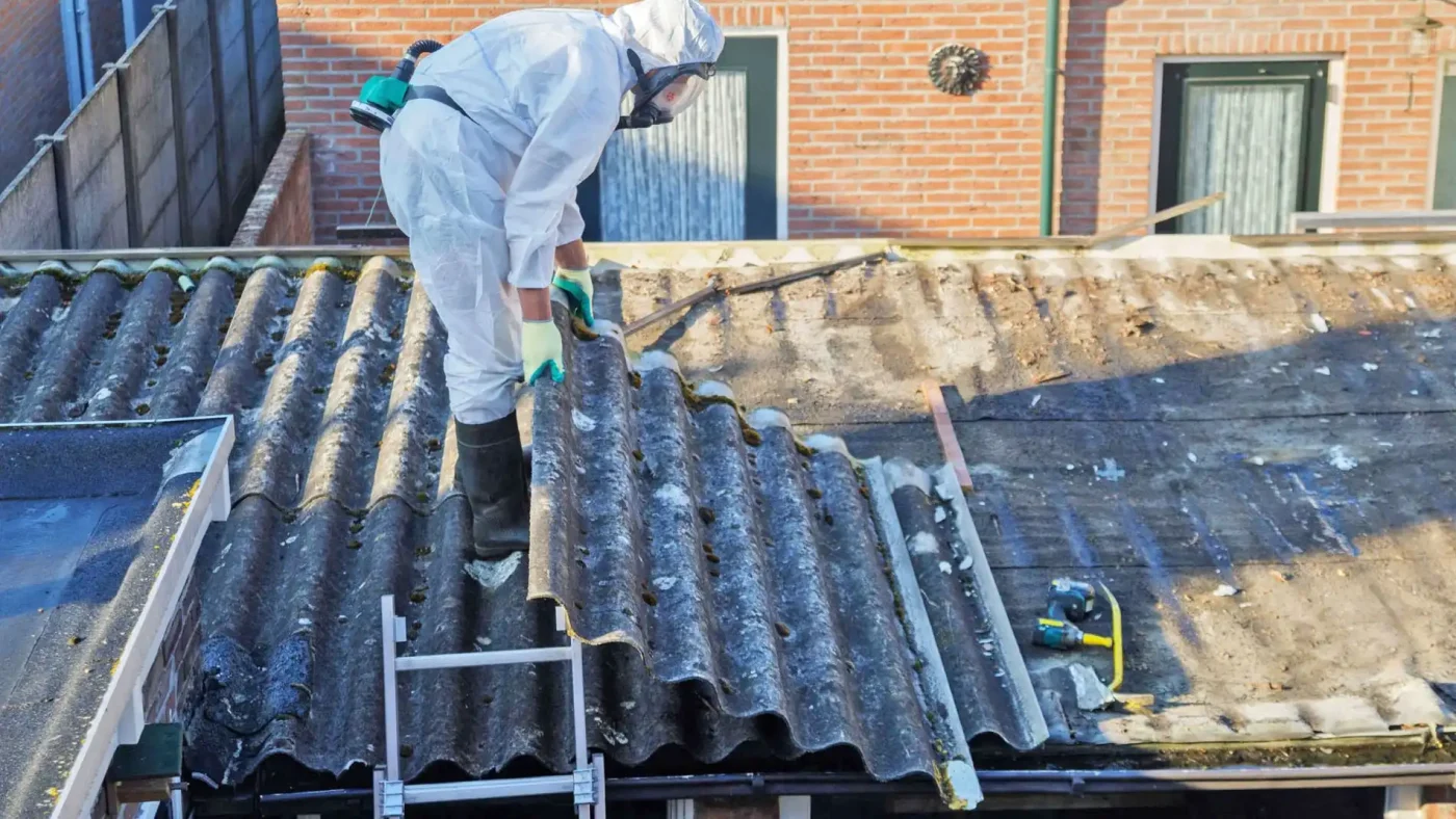 Licenced asbestos removal of roofing from building by Top Gun in Logan, Brisbane South East Qld.